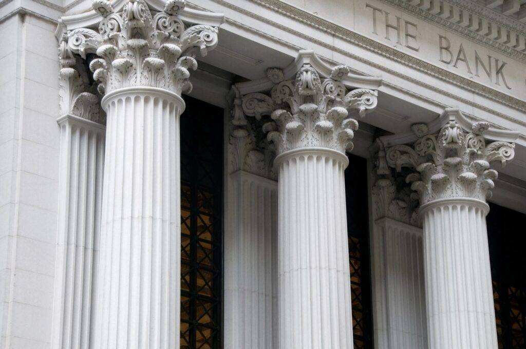Close-up view of the facade of the American Bank, focusing on the vault and the columns.
